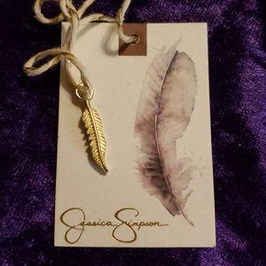 Jessica Simpson feather charm